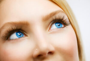 blue eyes woman looking up