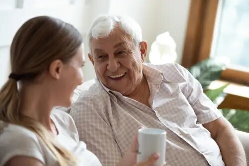 father and daughter having a conversation with coffee