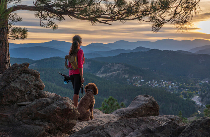 girl and dog on high mountain at Cutarelli Vision