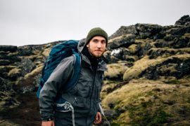 man hiking on rocky mountain