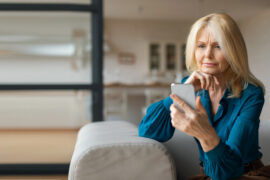 woman looking at phone