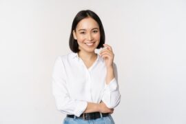 woman wearing white polo satisfied on the services at Cutarelli Vision