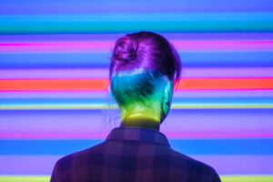 young woman looking around at modern immersive